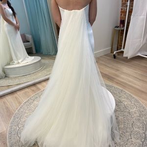 Brand new - never worn, Watters ivory  pearl cape. In perfect condition.